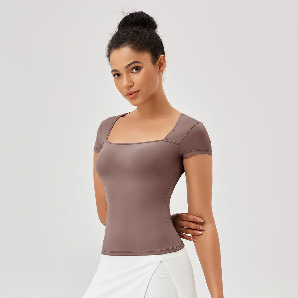 Magliette da yoga Magliette sportive da allenamento per palestra da donna Camicie da yoga ad asciugatura rapida T-shirt sportiva casual da fitness da corsa all'aperto a maniche corte